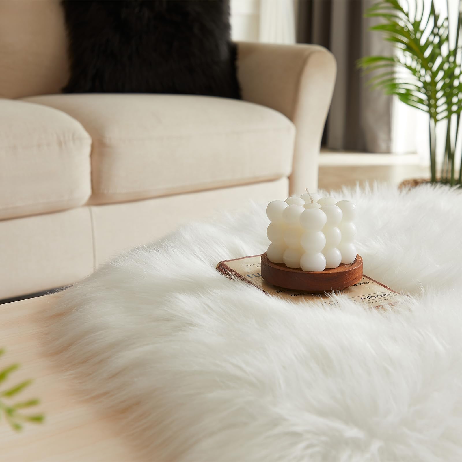 EasyJoy white sheepskin rug soft pile closeup emphasizes creamy color and texture.
