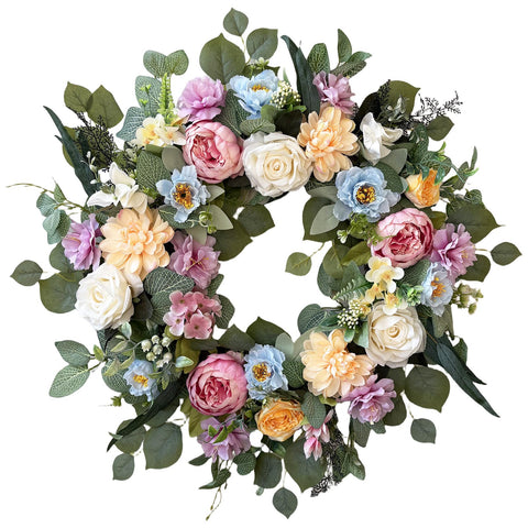 Ecerangus spring wreath on front door with white hydrangea and eucalyptus.