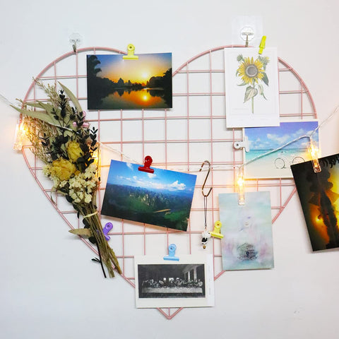 ECLENYES photo display grid shows a heart-shaped pink frame for versatile decor.