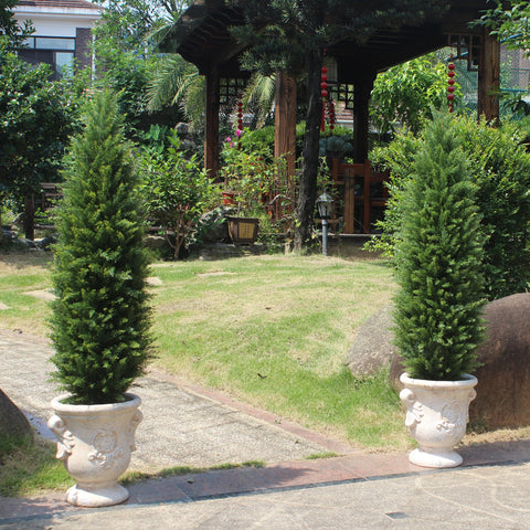 Close-up of ECOLVANT cedar topiary leaves showing realistic texture.