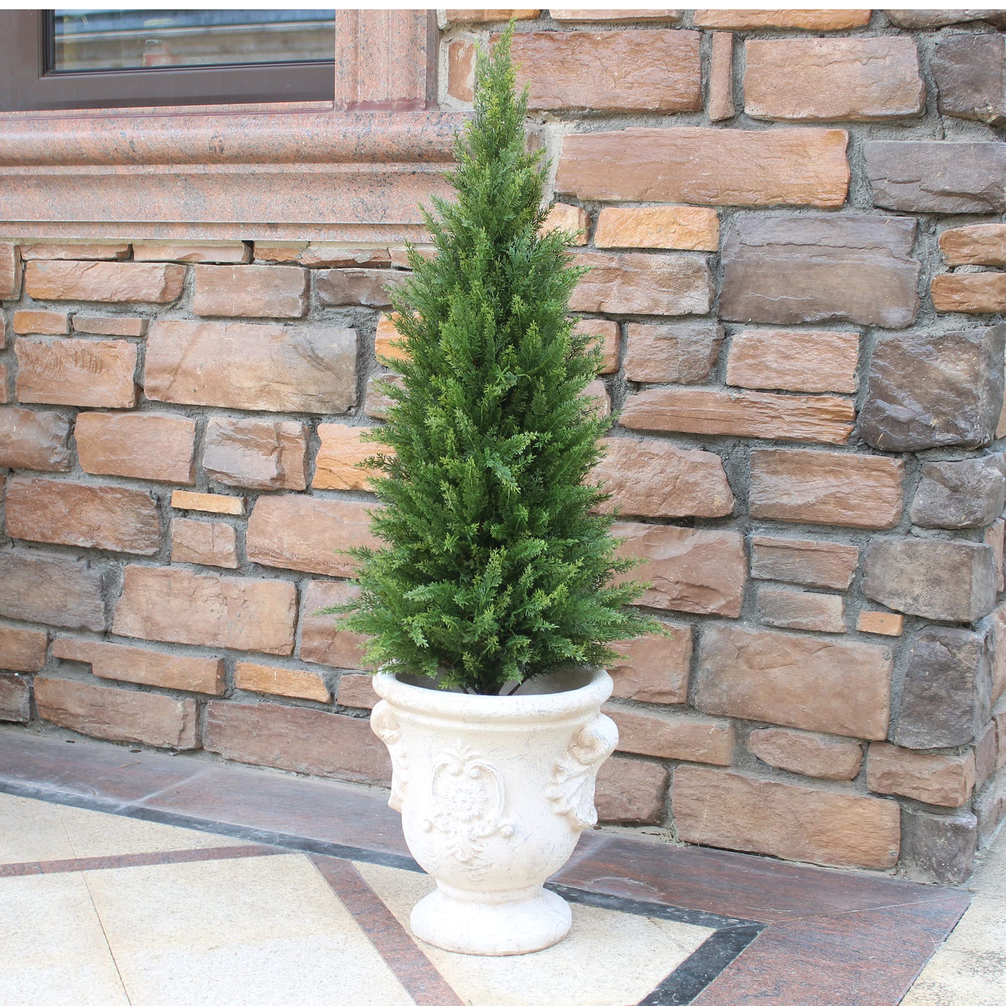 ECOLVANT topiary fits various planters for flexible display.
