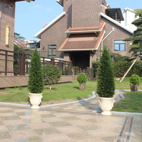 ECOLVANT potted cedar display in urn setup for curb appeal