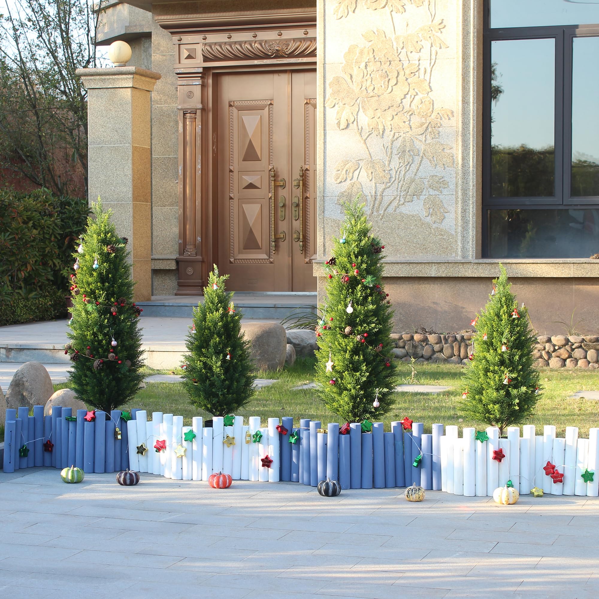 ECOLVANT topiary in a patio planter creates curb appeal.