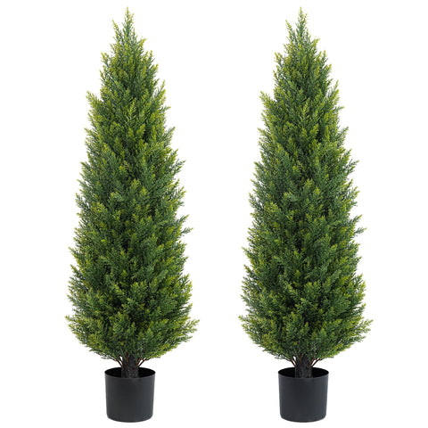 ECOLVANT two 4ft topiary on the front porch add evergreen charm.