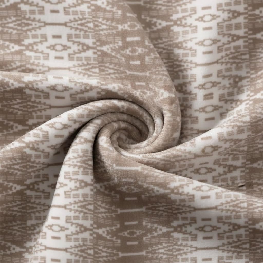 Eddie Bauer Sherpa throw blanket used as bed layer for extra warmth and style