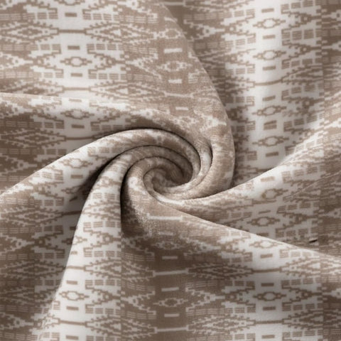 Eddie Bauer Sherpa throw blanket used as bed layer for extra warmth and style