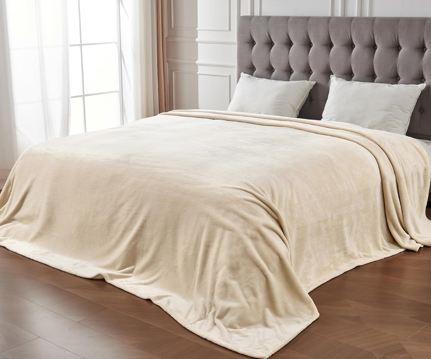 Edenleaf giant family blanket on bed shows generous coverage.