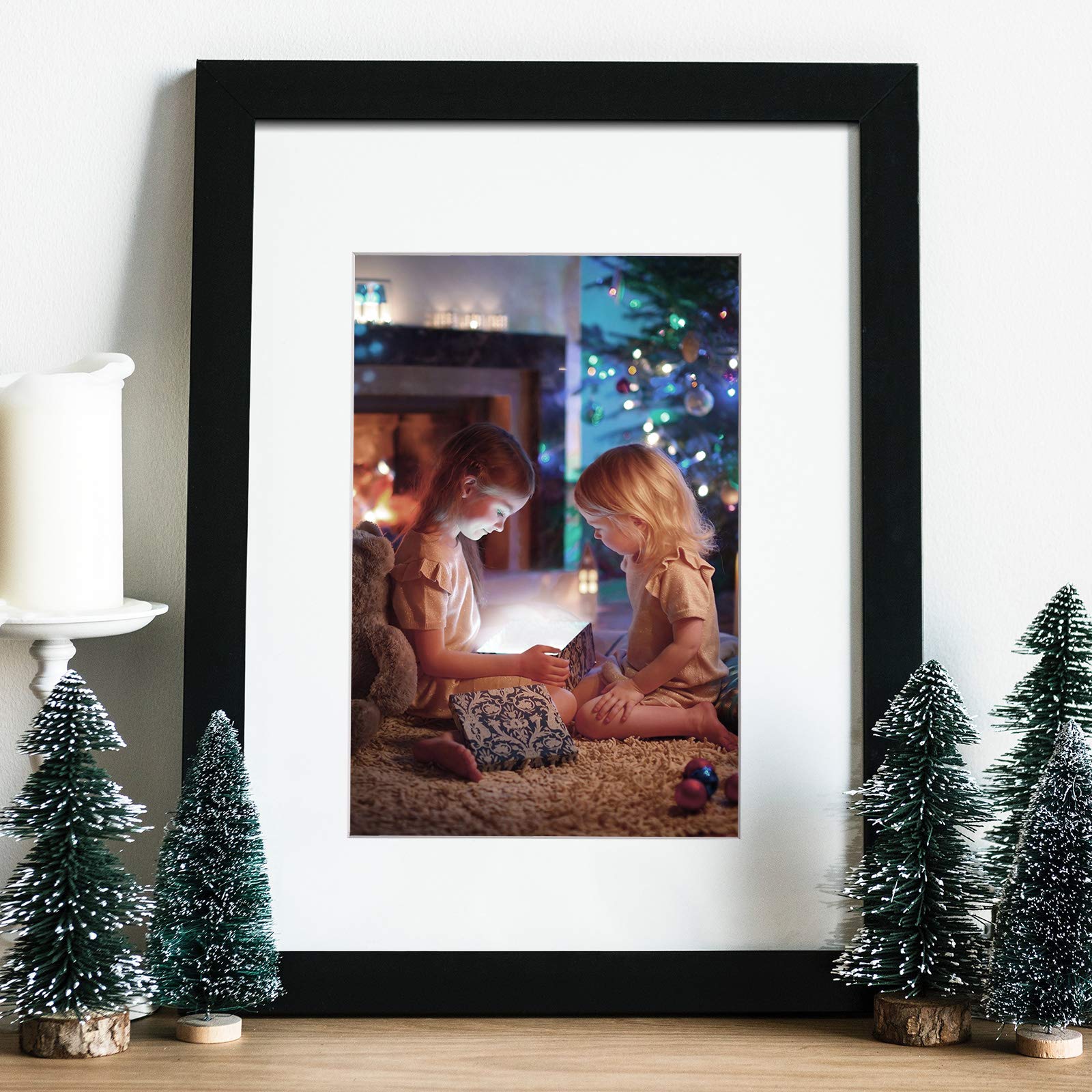 Egofine black 11x14 frame mounted on wall