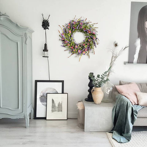 egolot large wreath on door creates bold entryway decor.