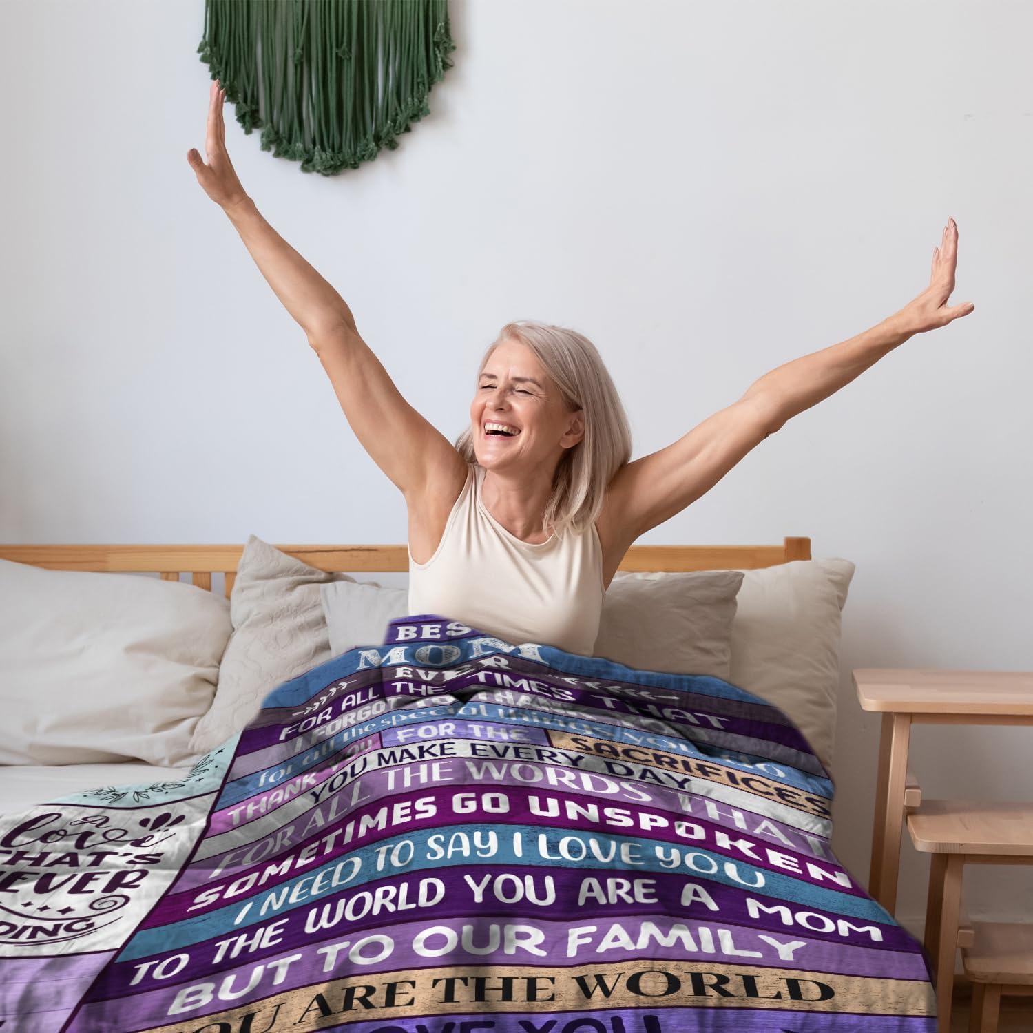 Ekpvgit Mothers Day Blanket 60x50 inches on a couch for cozy evenings.