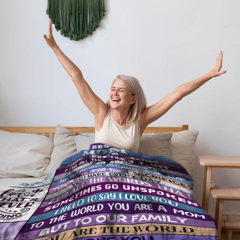 Ekpvgit Mothers Day Blanket 60x50 inches on a couch for cozy evenings.