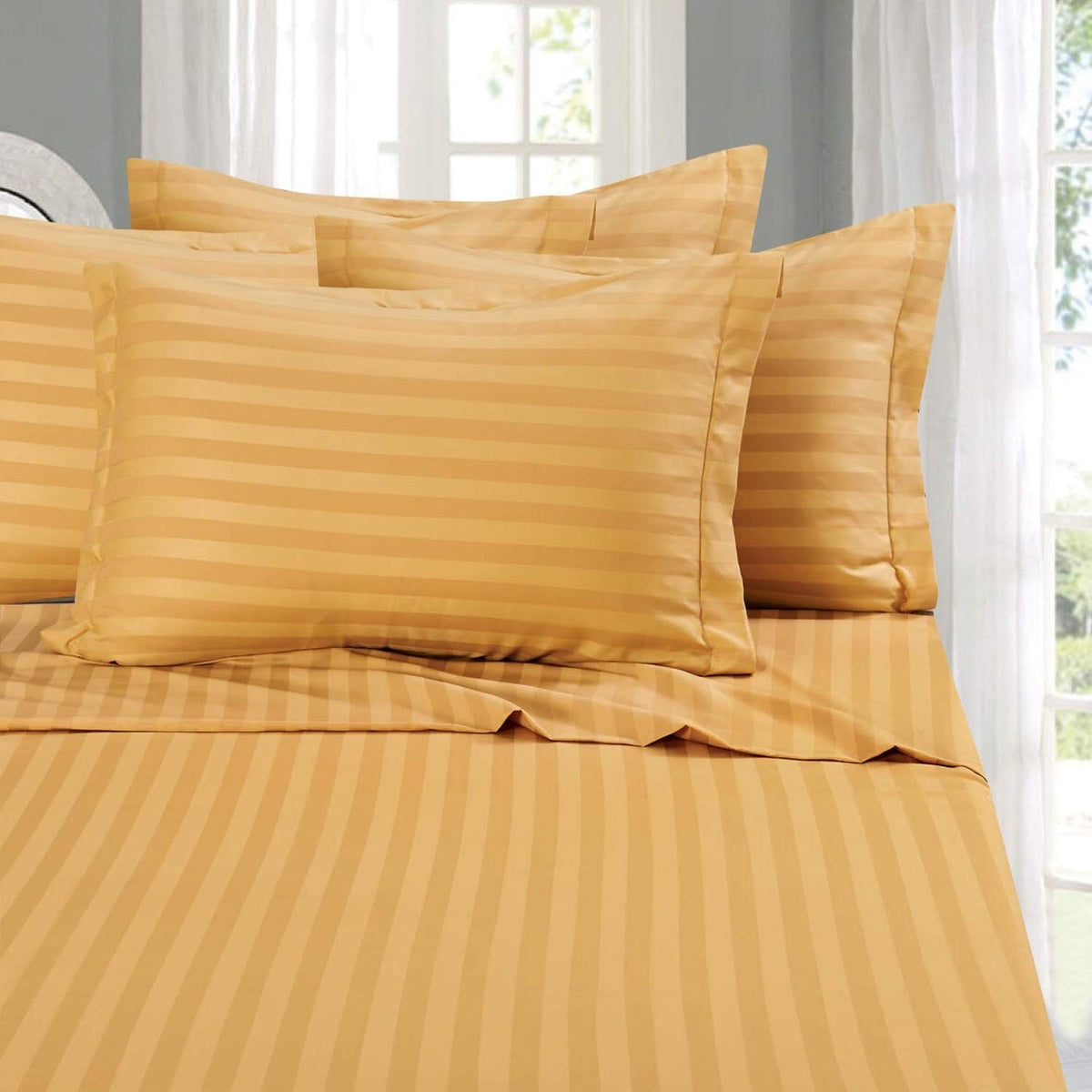 Elegant Comfort 6-piece sheet set on bed, ultra-soft and hotel-quality for deep, comfortable sleep.