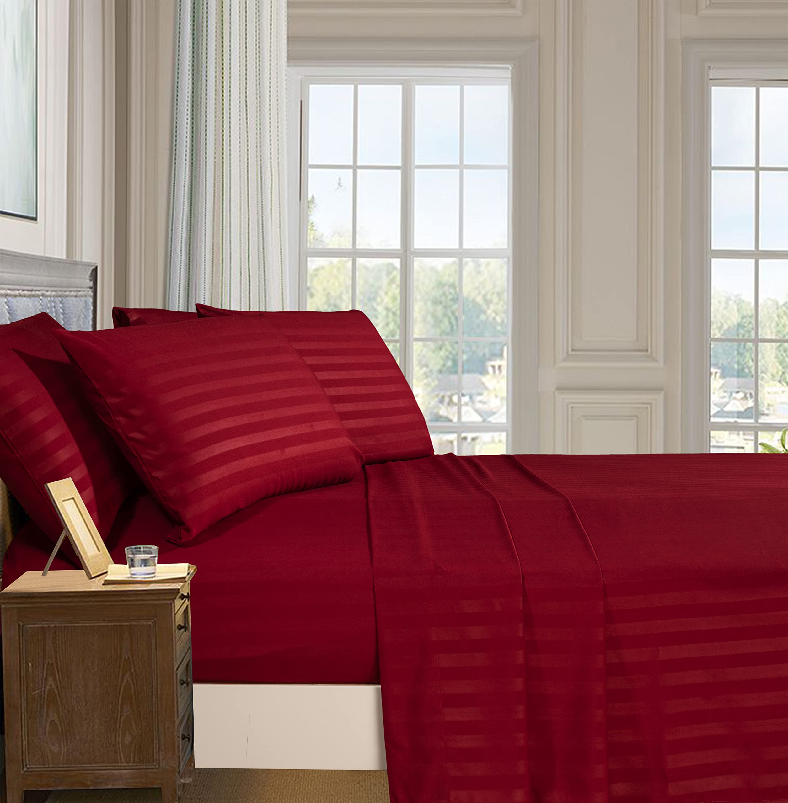 Elegant Comfort queen deep-pocket fitted sheet secures a snug, durable fit.