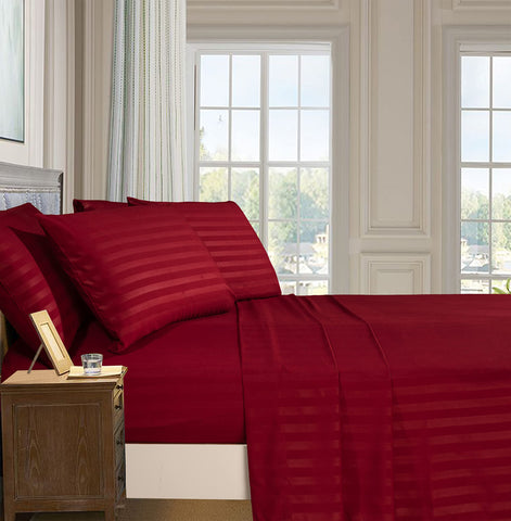 Elegant Comfort queen deep-pocket fitted sheet secures a snug, durable fit.