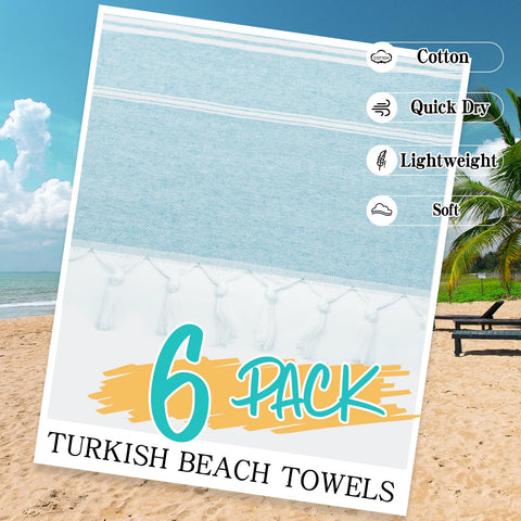 Eliamo 36x71-inch towel open for generous coverage on the sand.