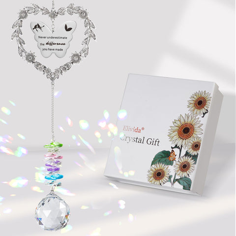 Elivida sun catcher with heart wreath glints in sunlight and adds warmth to the space.