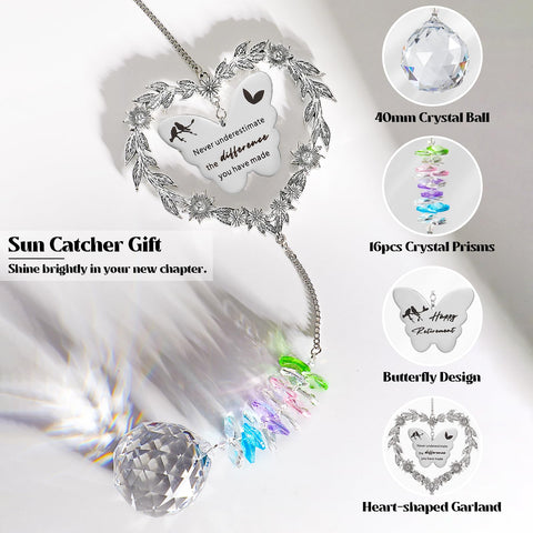 Elivida sun catcher hangs in a window, creating rainbow light patterns.