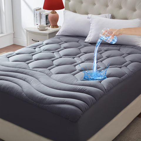 Elven Home full-size mattress pad with waterproof backing guards against spills and stains.