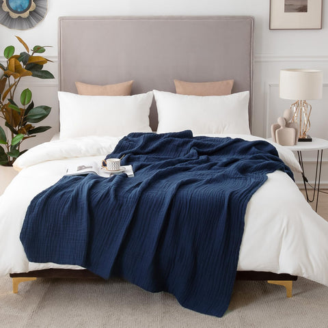 Care instructions label on EMME muslin blanket navy for cold wash