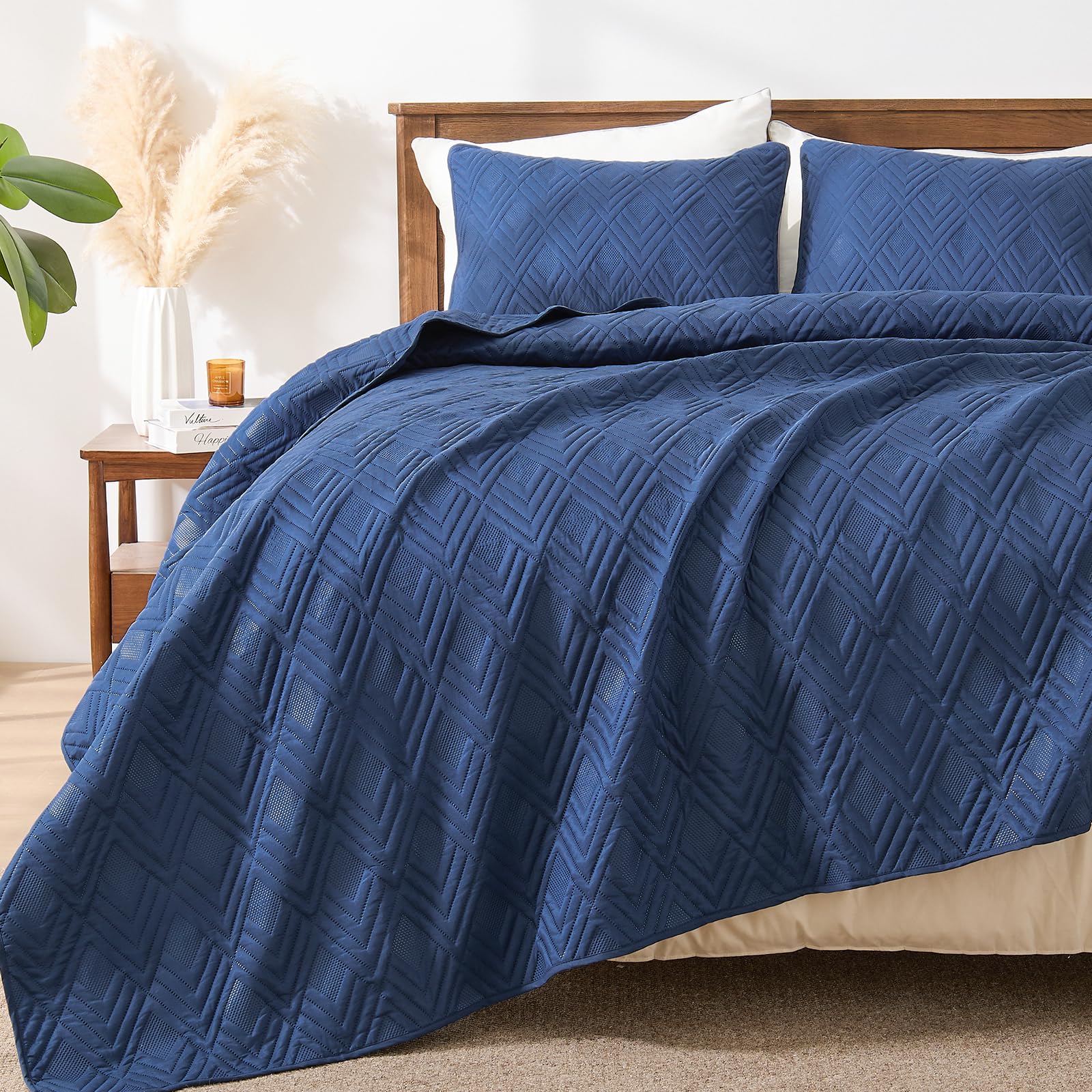 EMME Quilts queen navy diamond pattern adds a cozy, timeless bedroom focal point.