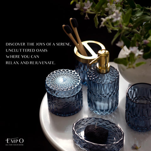 EMPO clear glass tumbler provides neat brush storage.