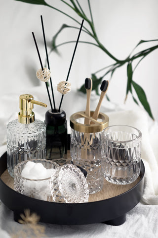 EMPO clear glass set enhances bathroom ambience with light reflections