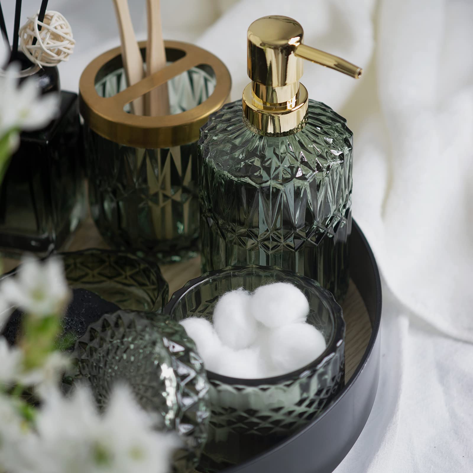 EMPO green glass six-piece set on vanity demonstrates cohesive styling