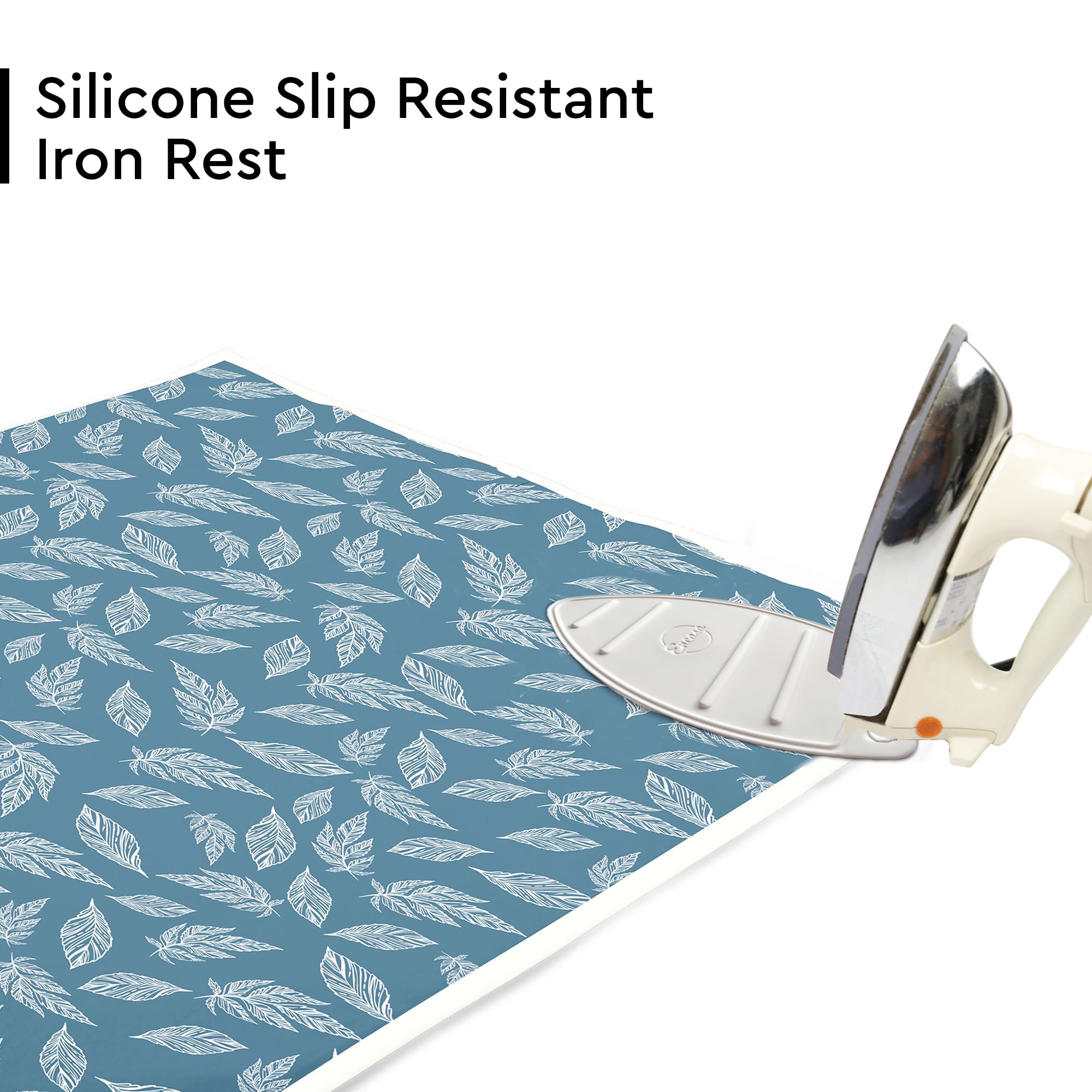 Encasa XO ironing mat shows integrated silicone iron rest for safe placement.