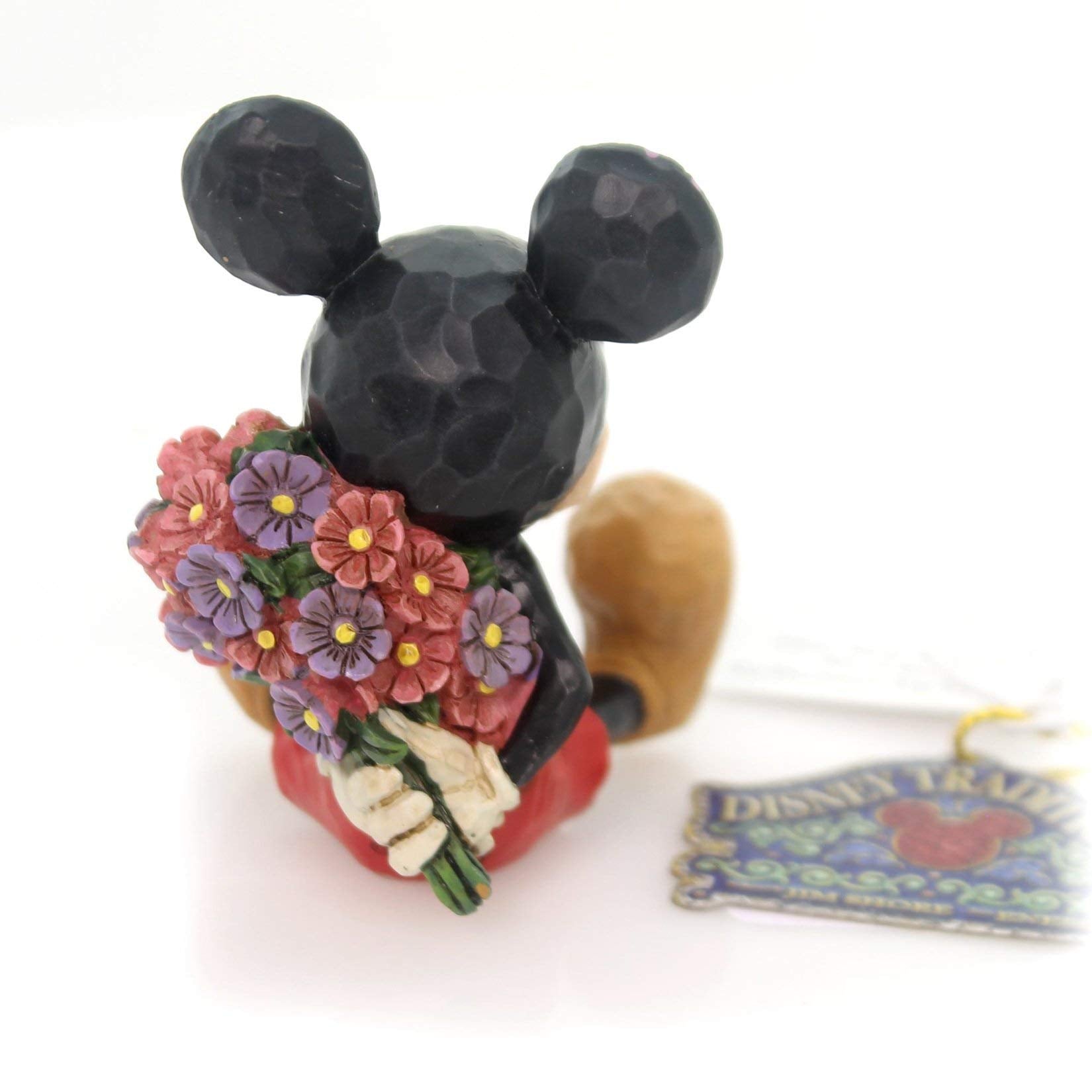 Enesco Disney Traditions Mini Mickey hiding bouquet pose adds playful surprise.
