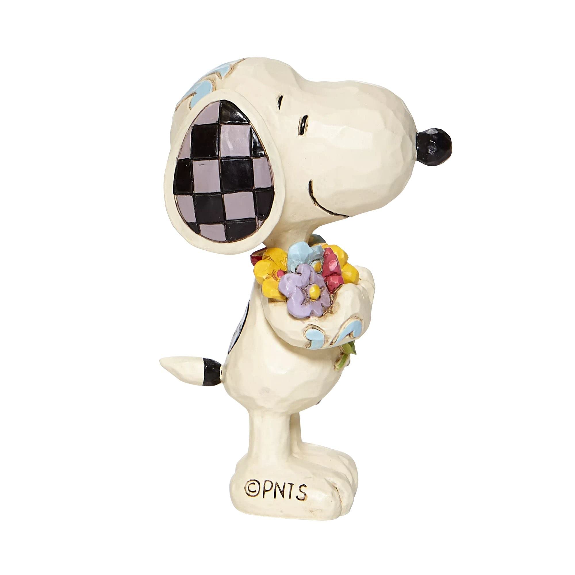 Classic Peanuts motif reimagined in Jim Shore folk-art style by Enesco.