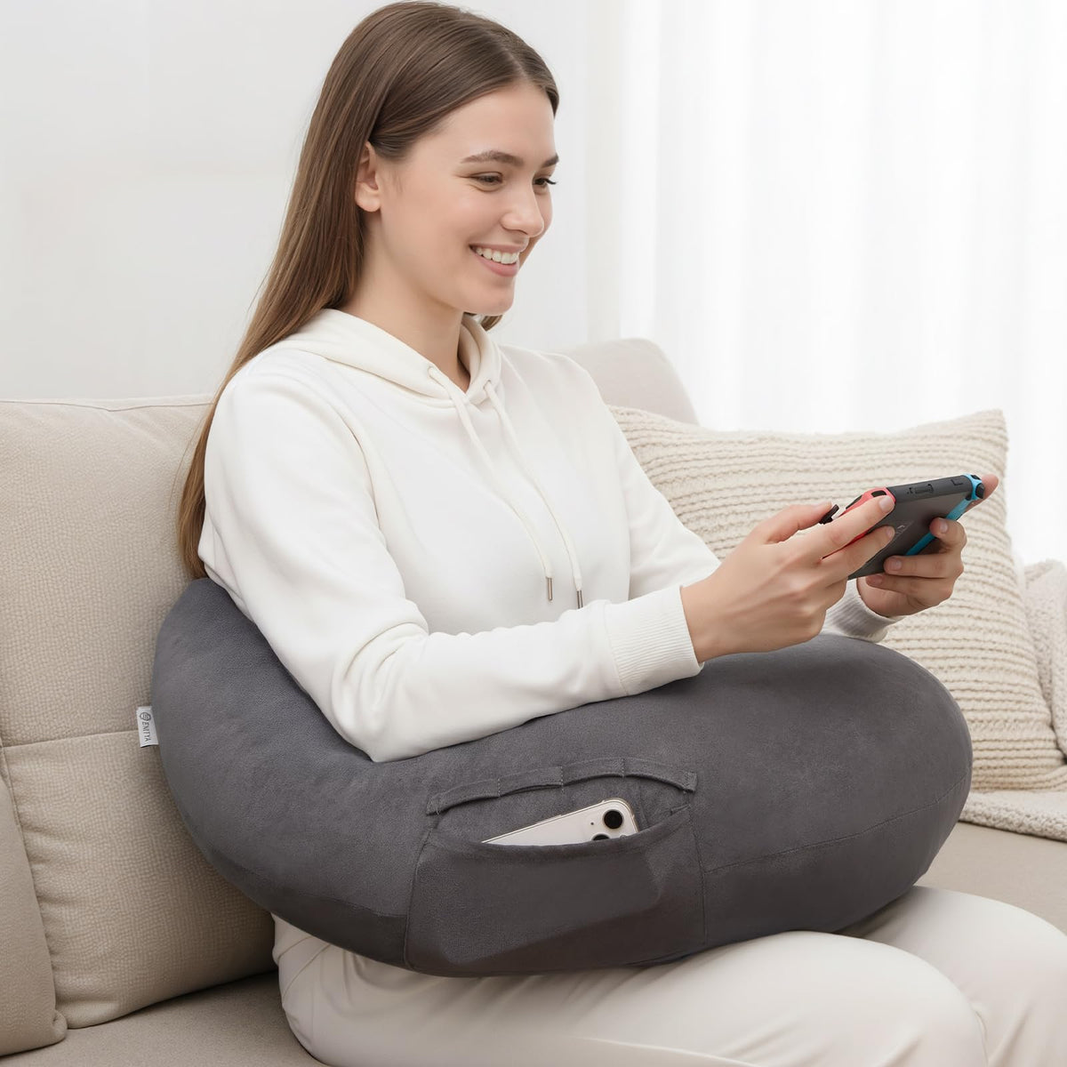ENITYA extra-large ergonomic pillow crocheting-ready lap surface for comfortable crafting in bed.