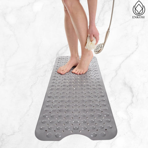 ENKOSI bath mat showing drain holes for quick water drainage.