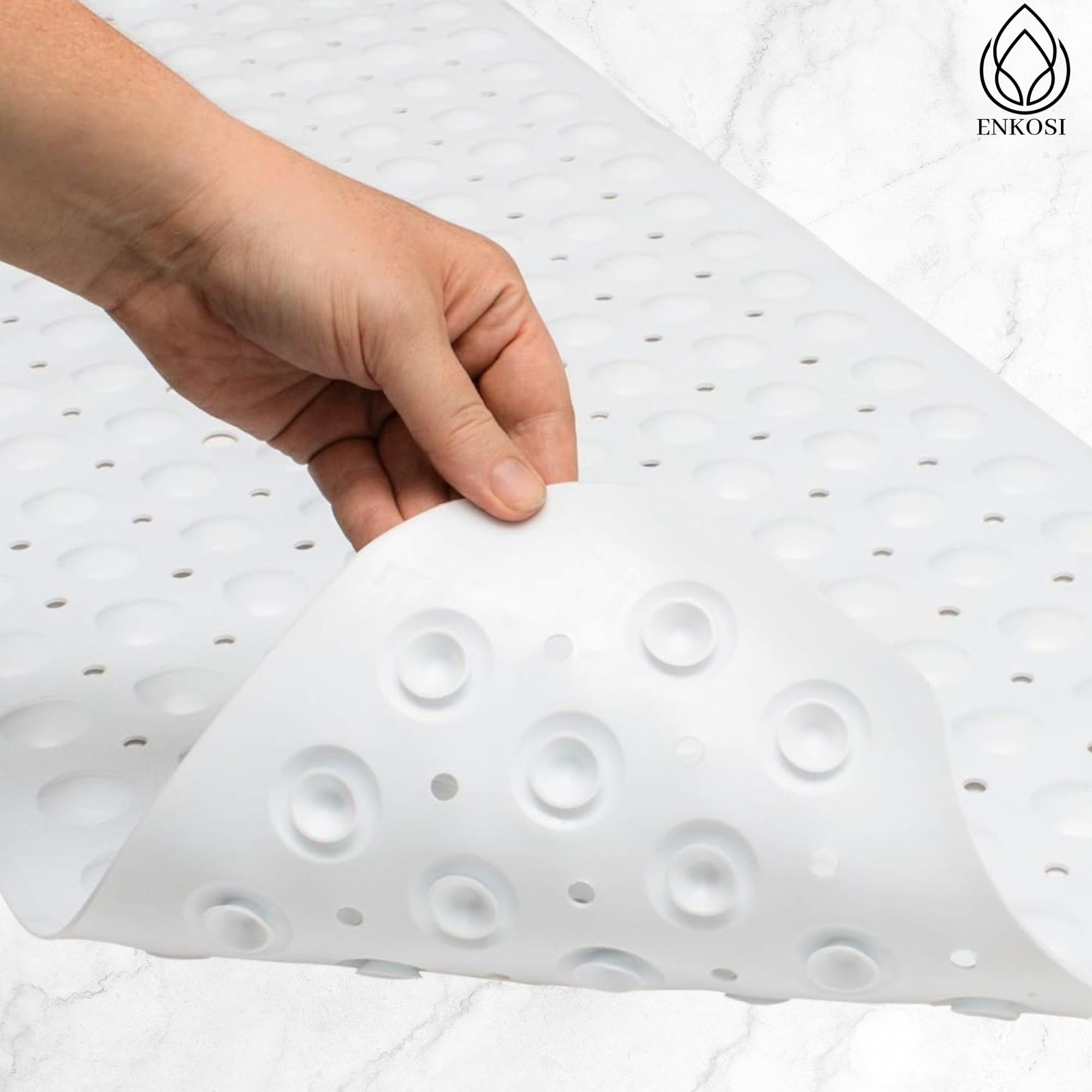 ENKOSI bath mat strong-suction-cups secure placement on smooth surfaces.
