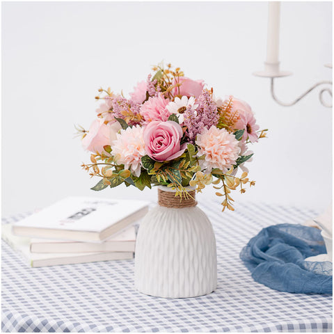Epicpetal pink fake flowers on an office desk for color