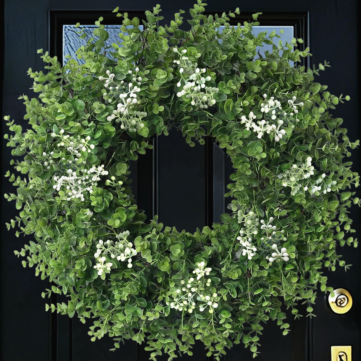 Eqanro 26-inch boxwood wreath on front door adds year-round curb appeal