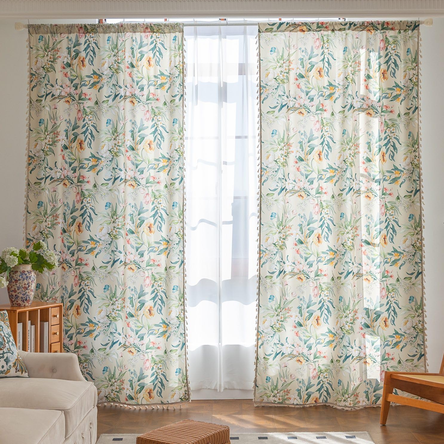 Erbnaryx green floral drapes with tassel trim for a cozy French country vibe.