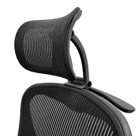 ERGOKING headrest attachment on Aeron chair provides secure neck support.