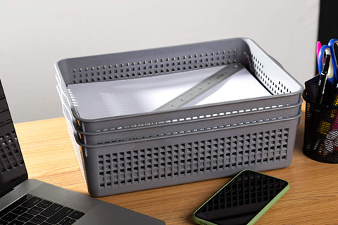 Eslite multipurpose gray baskets offer versatile storage solutions.