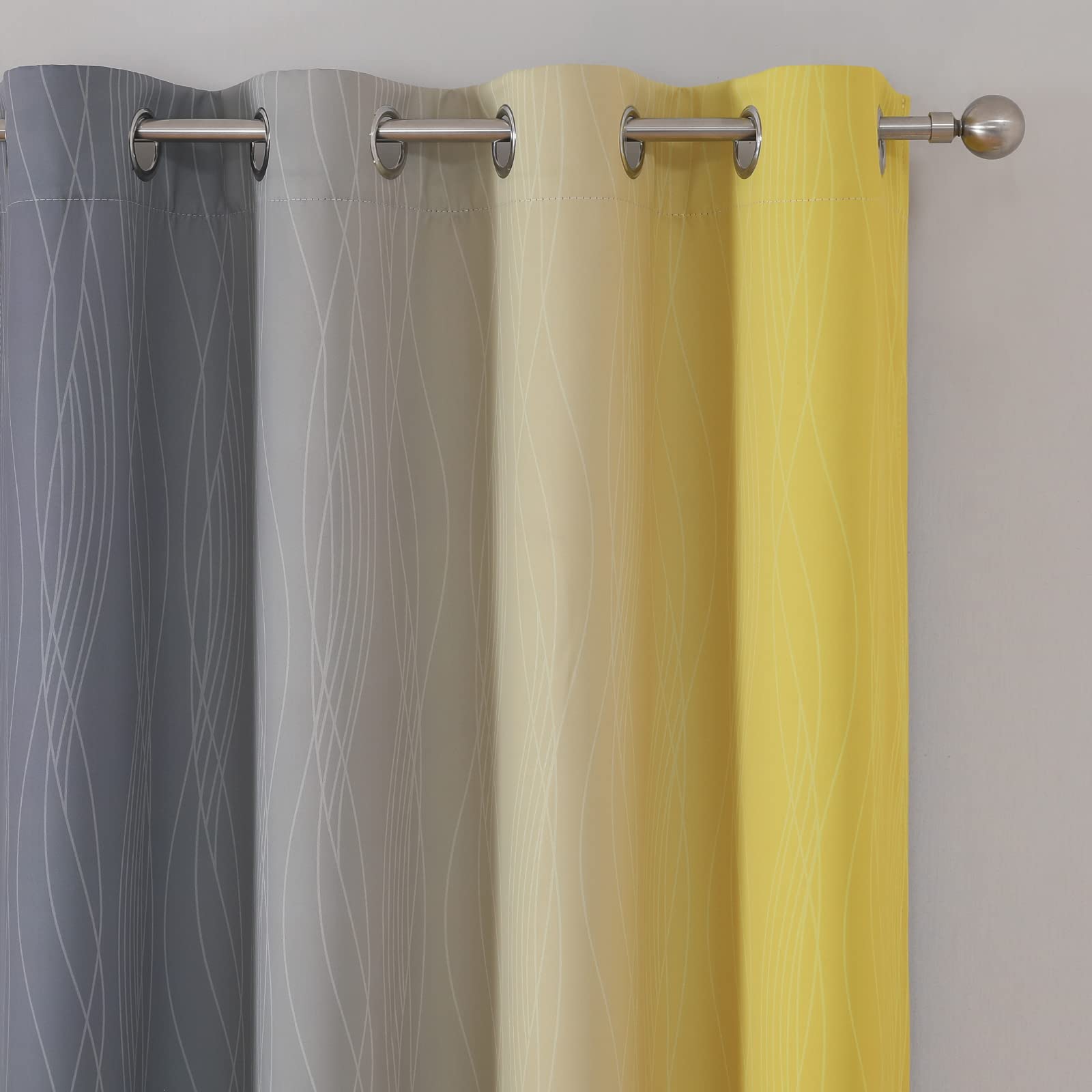 Estelar Textiler ombre curtains with metal grommets for smooth operation.