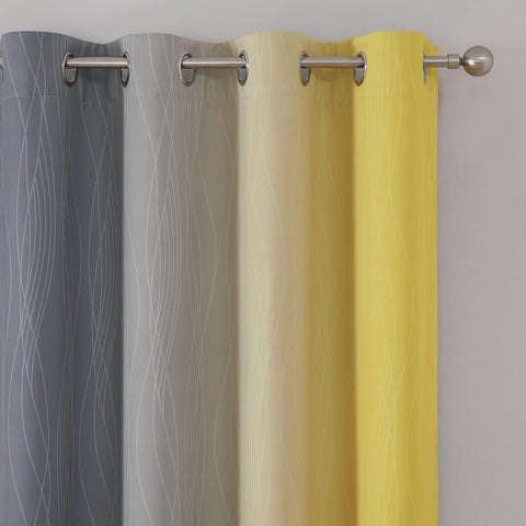 Estelar Textiler ombre curtains with metal grommets for smooth operation.