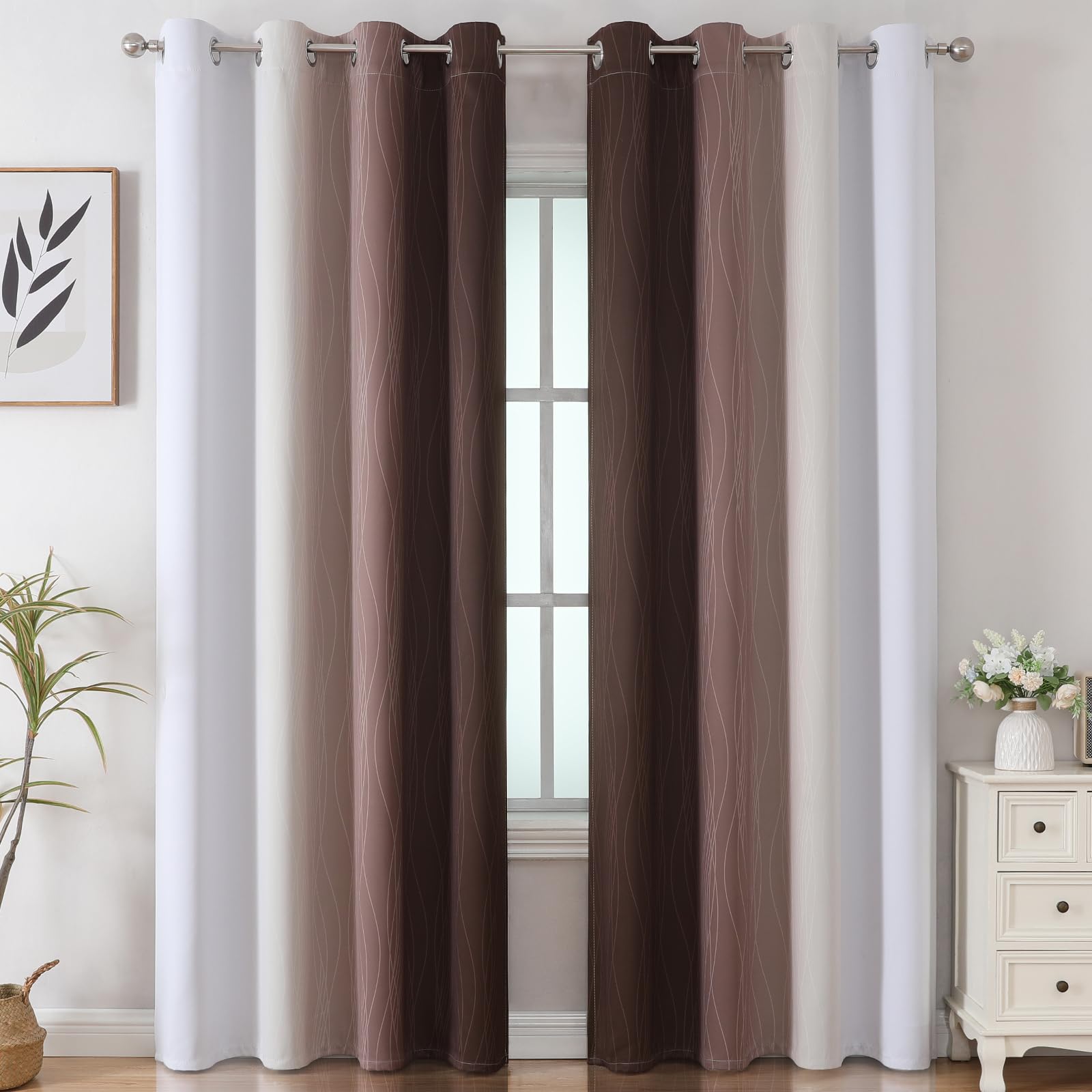 Estelar Textiler gradient-ombre drapes showcase contemporary style while blocking light.