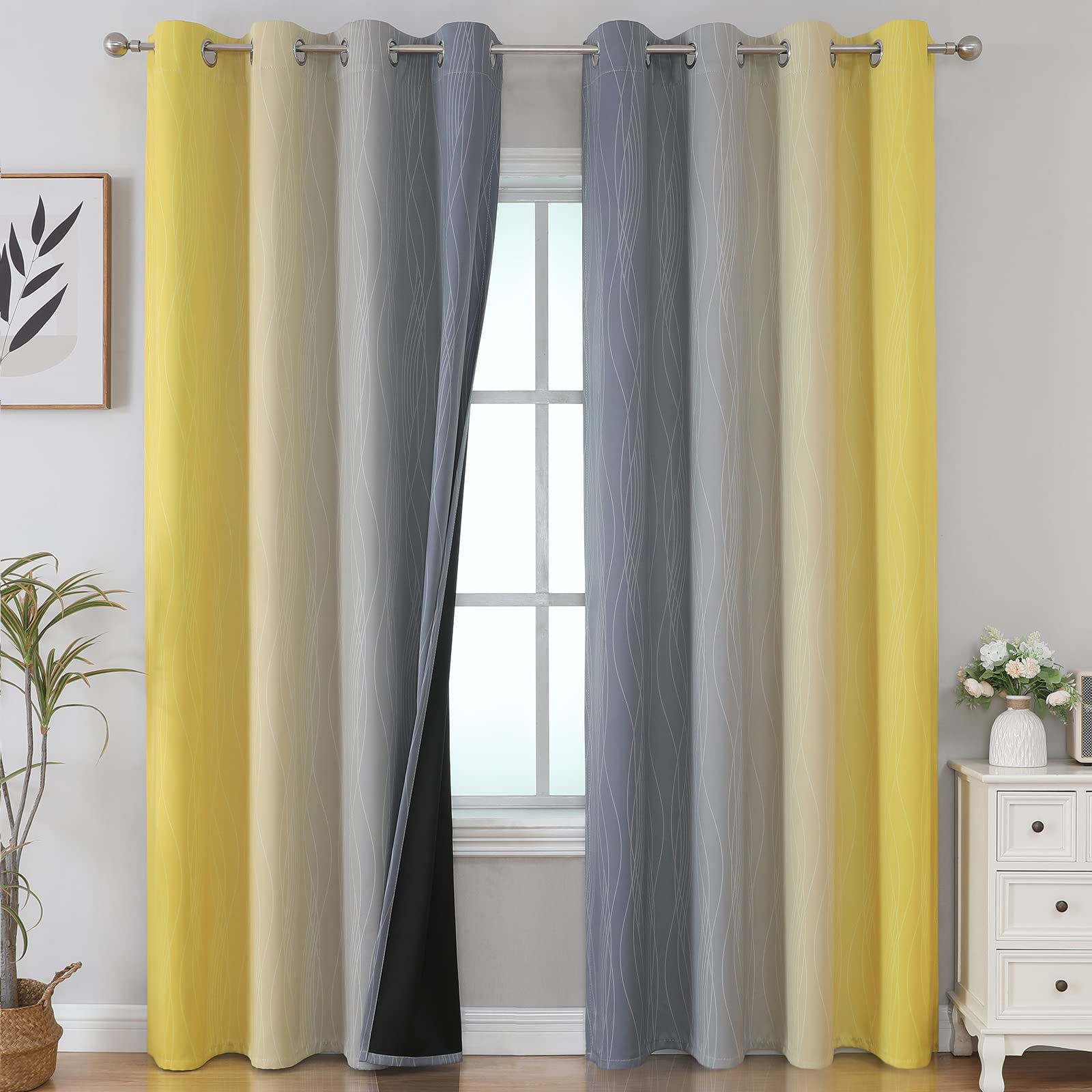 Estelar Textiler grey-yellow ombre curtains block light and brighten the living room.