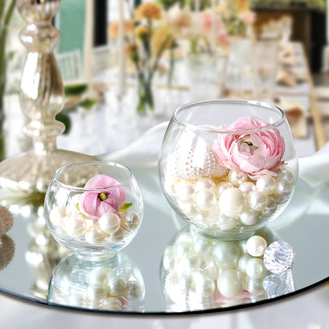 Etolies mini globe vase centerpiece brings modern table flair.