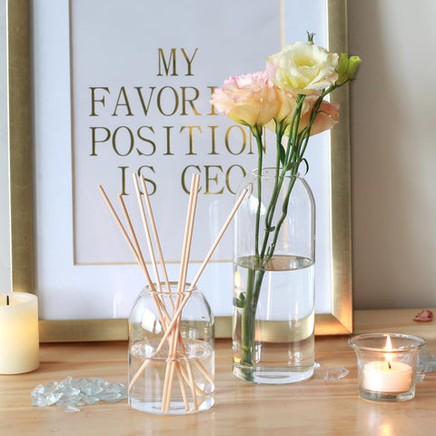 Etolies wedding centerpieces using clear cylinder vases
