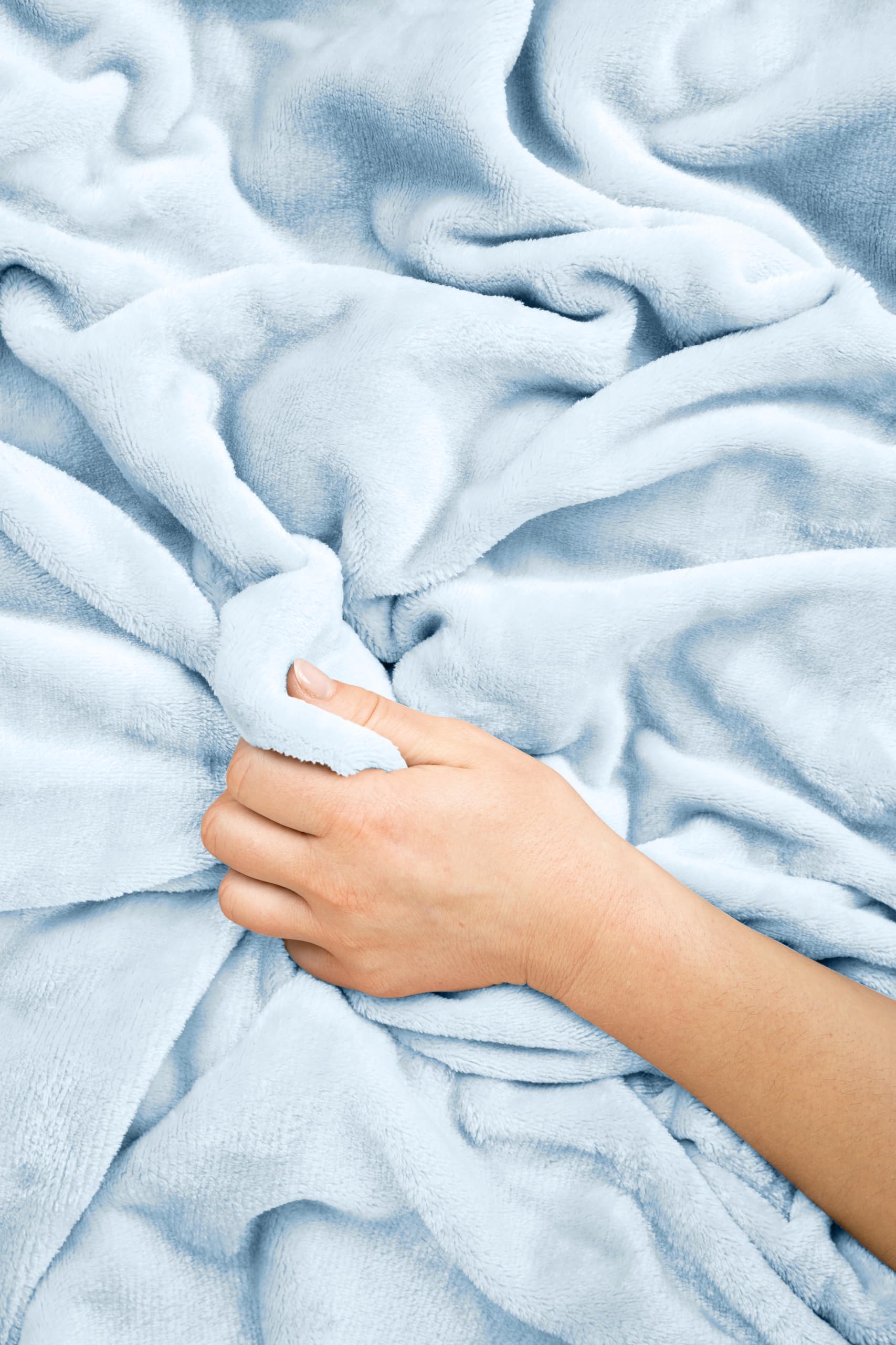 EverSnug blanket attached to luggage sleeve for easy transport.