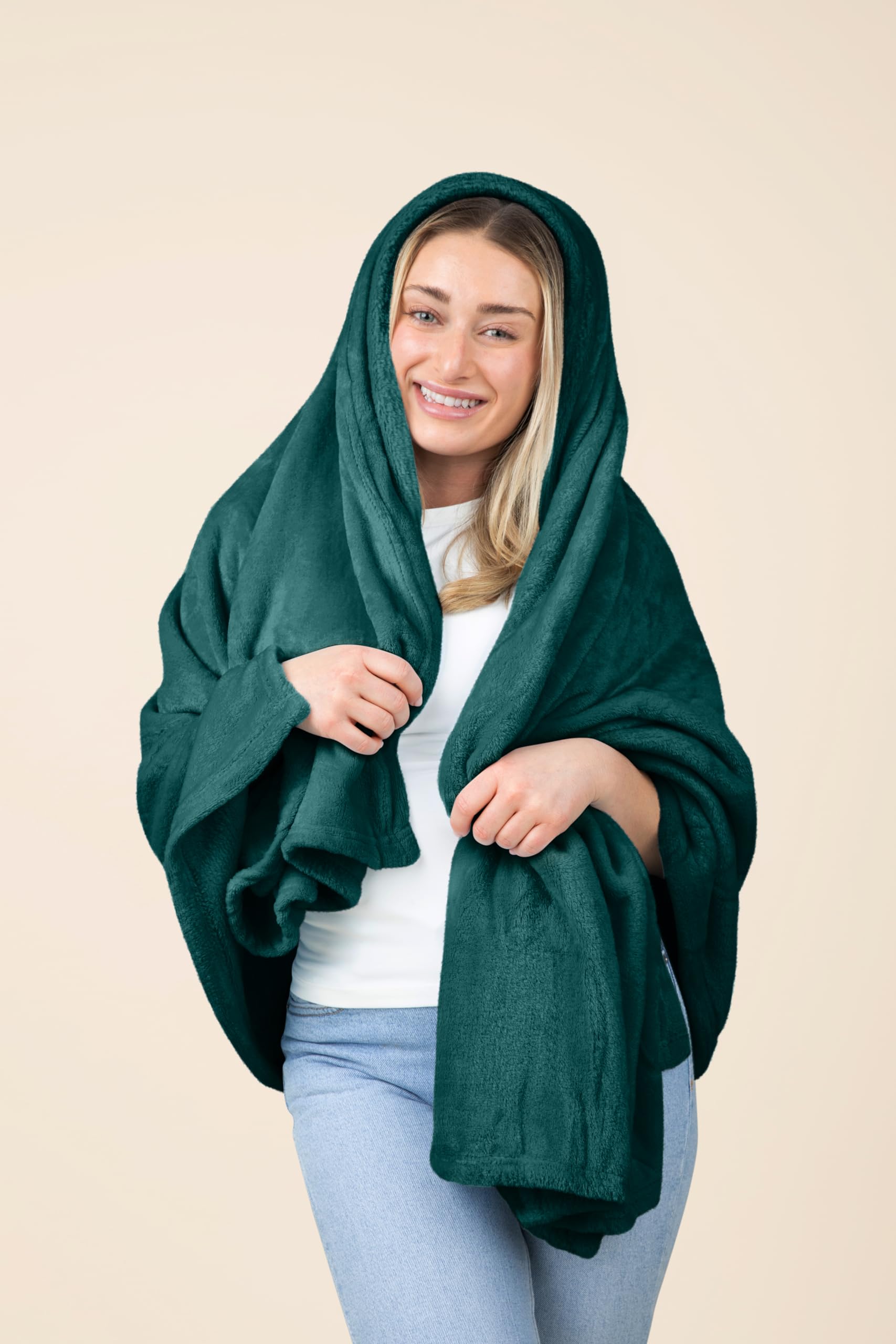 EverSnug travel blanket teal unfolded, soft warmth for flights.
