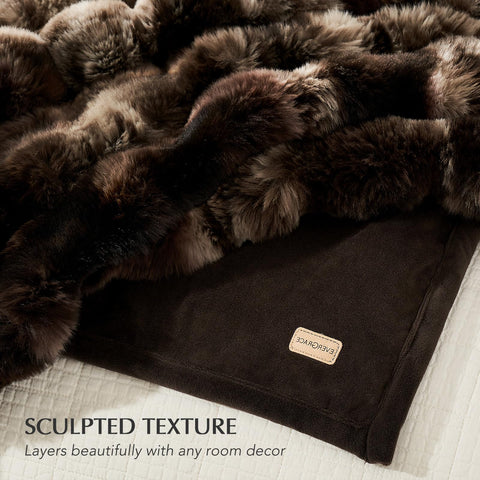 EverGrace faux fur throw draped on bed nook for inviting comfort.