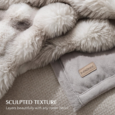 EverGrace Ridgeline blanket layered on bed enhances warmth and style.