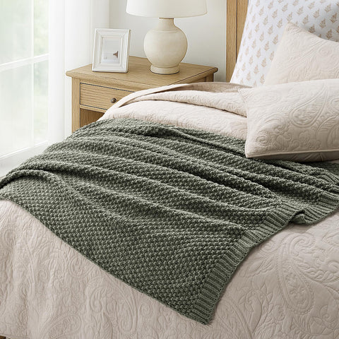 EVERGRACEHOME bed and sofa layering blanket neatly draped at foot of bed.