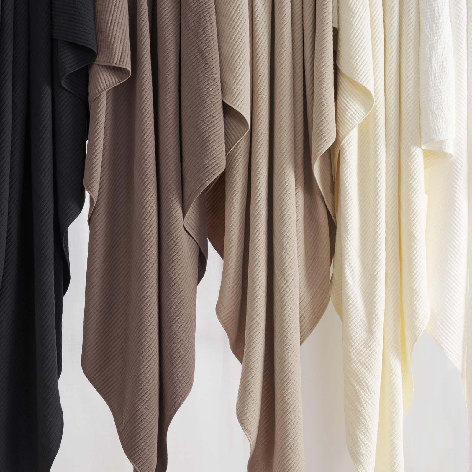 Evergracehome oversized coverlet drapes elegantly for a premium look.